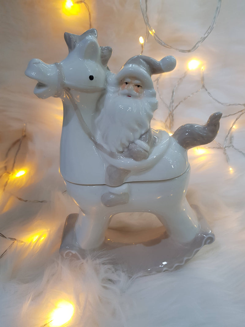 Babbo Natale su cavallo bianco